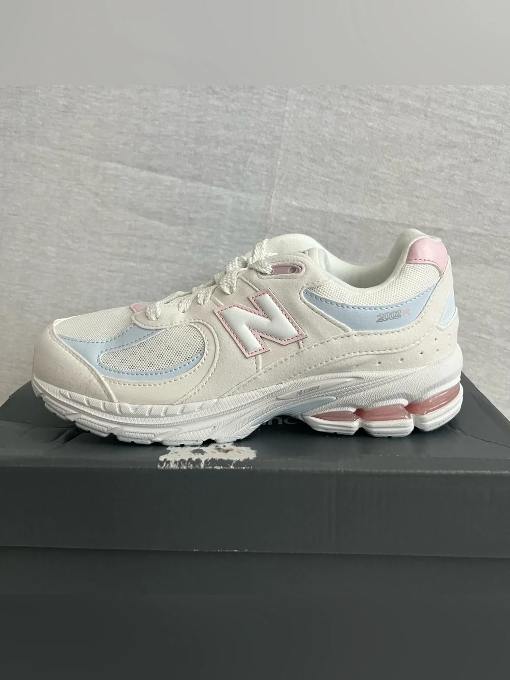 New Balance 2002 White Leather Sneakers with Pale Pink & Light Blue Accents